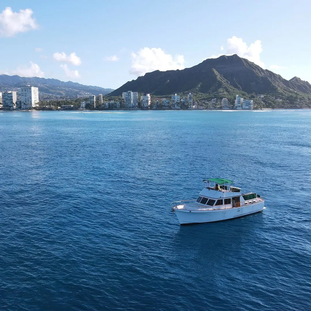 The Kona Star cruising past Diamond Head