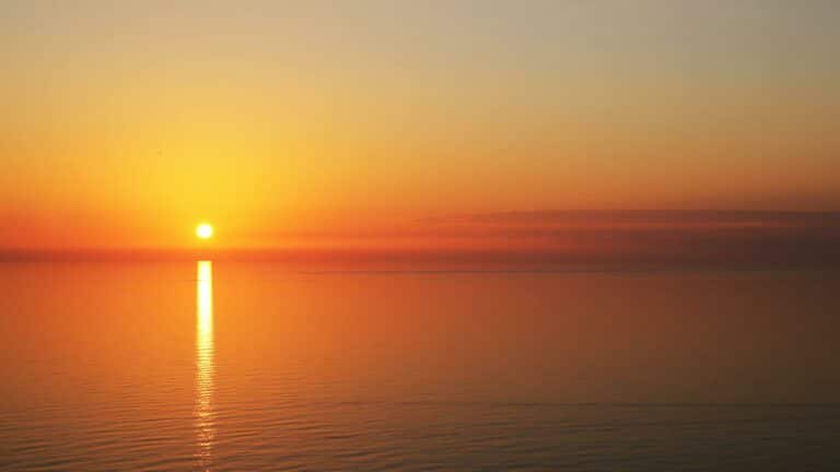 View of the sunset on the water.