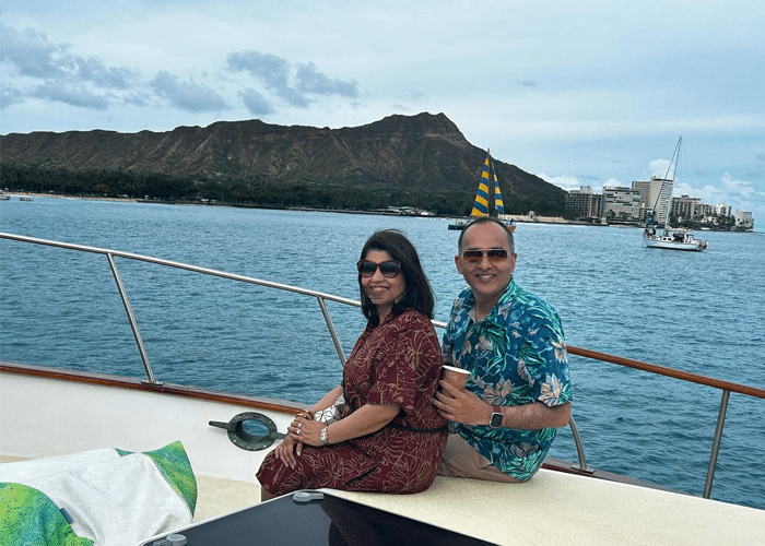 What to Expect on Scenic Waikiki Cruises in Honolulu? 1 Couples posing on the bow of the yacht