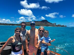 Small group celebrating special occasion at sea