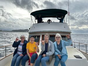 Friendly crew guiding guests on a small group tour