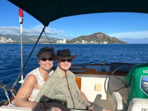 Sailing past Diamond Head with a cool ocean breeze