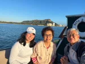 Small group enjoying a sunset sail on the Kona Star
